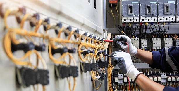 Professional Electrician technician working in Olympia Fields, IL
